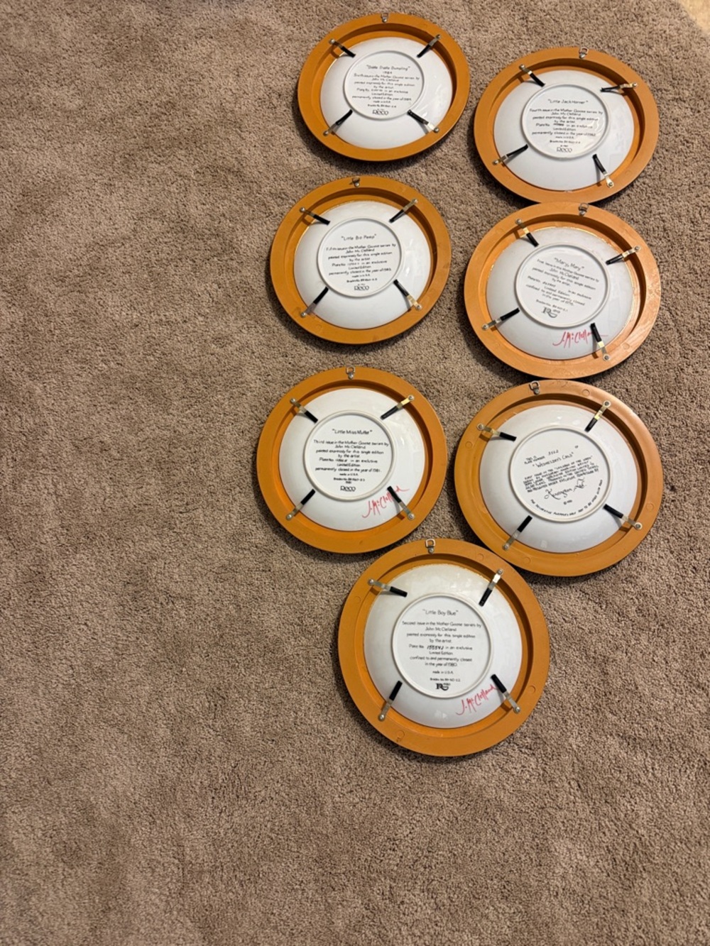 Set of 7 Round Wall Plates in Warm Orange